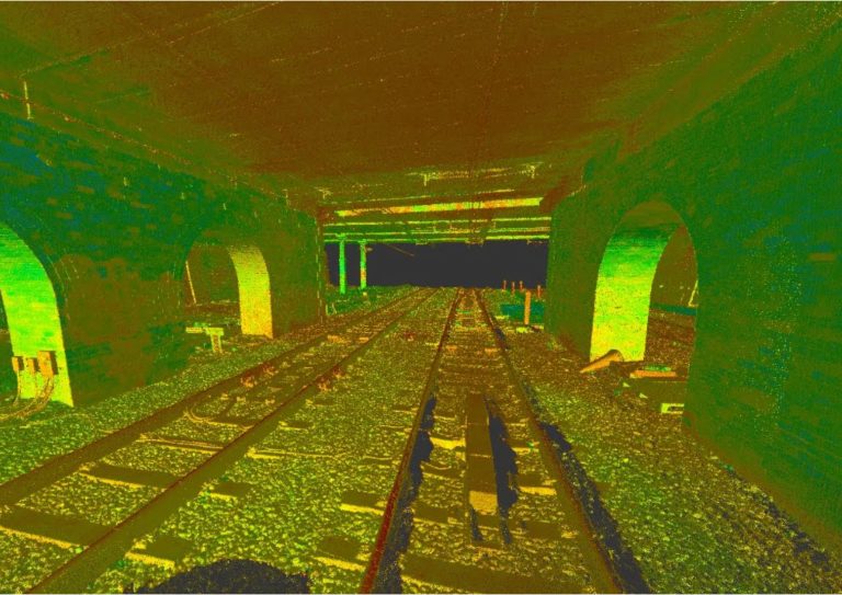 3D laser scanning point cloud of railway track under bridge showing rail infrastructure survey data clearance analysis and LiDAR mapping for engineering design