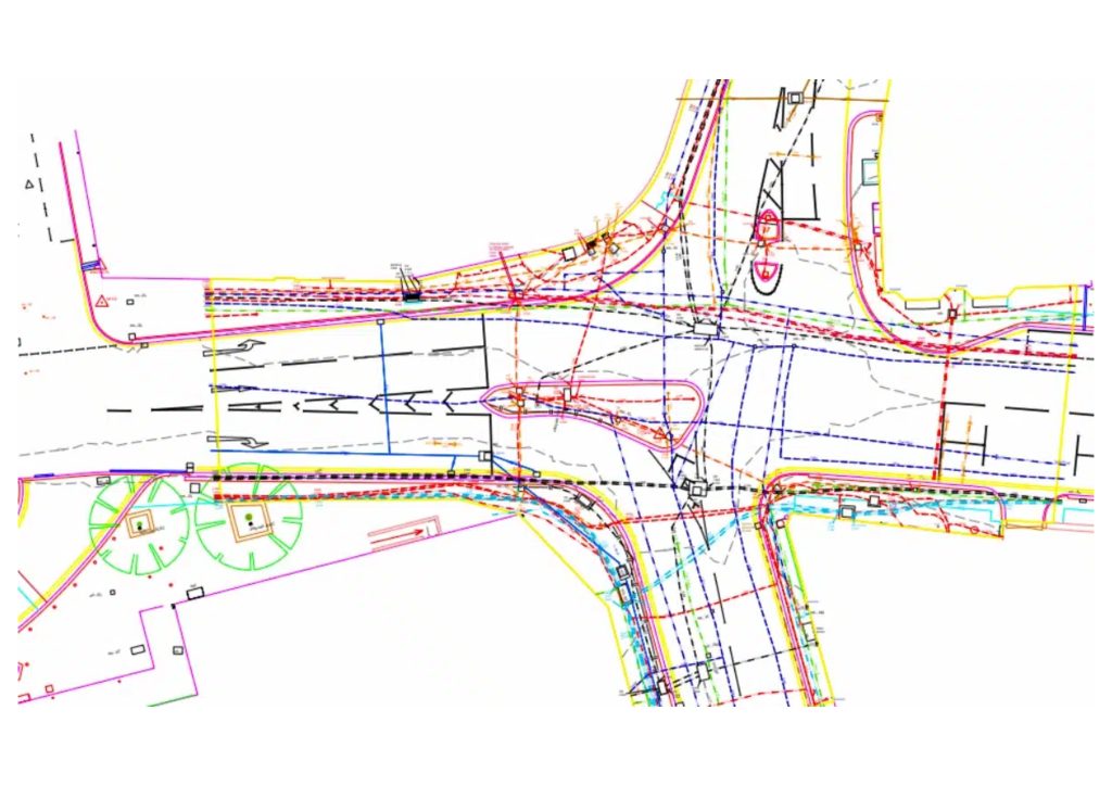 Topographical and utility survey of road junction in Colne showing PAS128 underground services mapping highway layout traffic islands and civil engineering design data