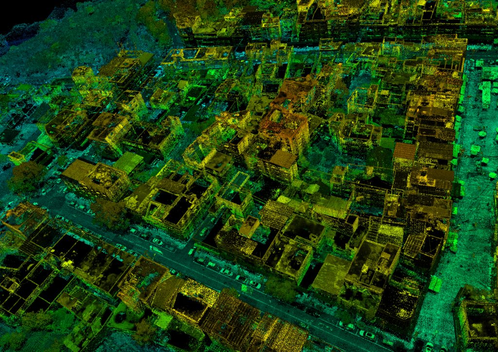Aerial LiDAR point cloud of urban area showing 3D laser scanning data for topographical survey digital twin modelling and scan to BIM workflows